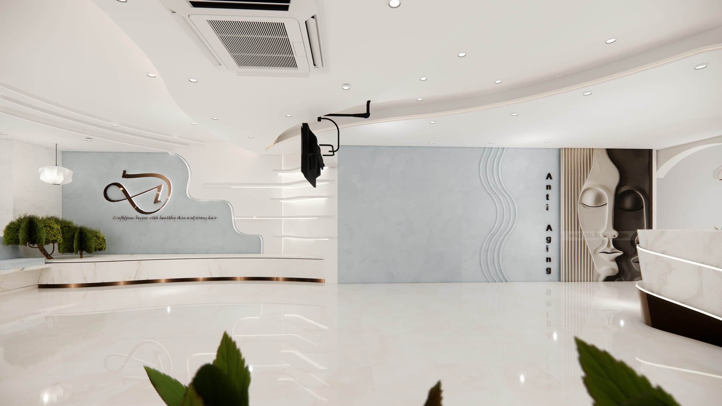 Reception and circulation with the brand-mark inlay across the floor