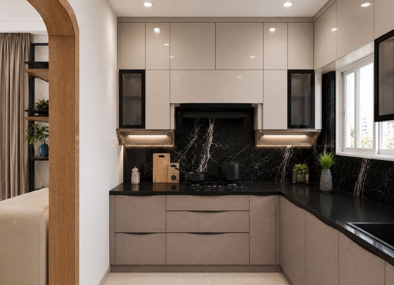 Modular kitchen in beige and matte black with a stone counter and backsplash