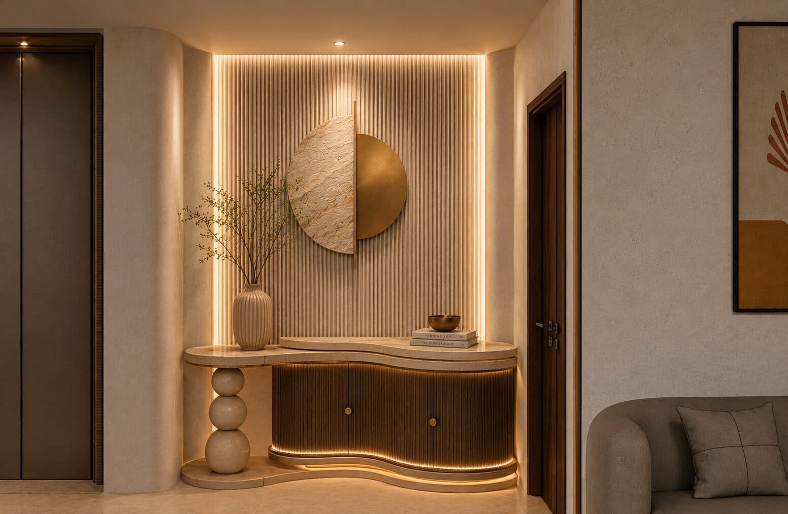 Foyer console with a brass disc mirror and a ceramic vase